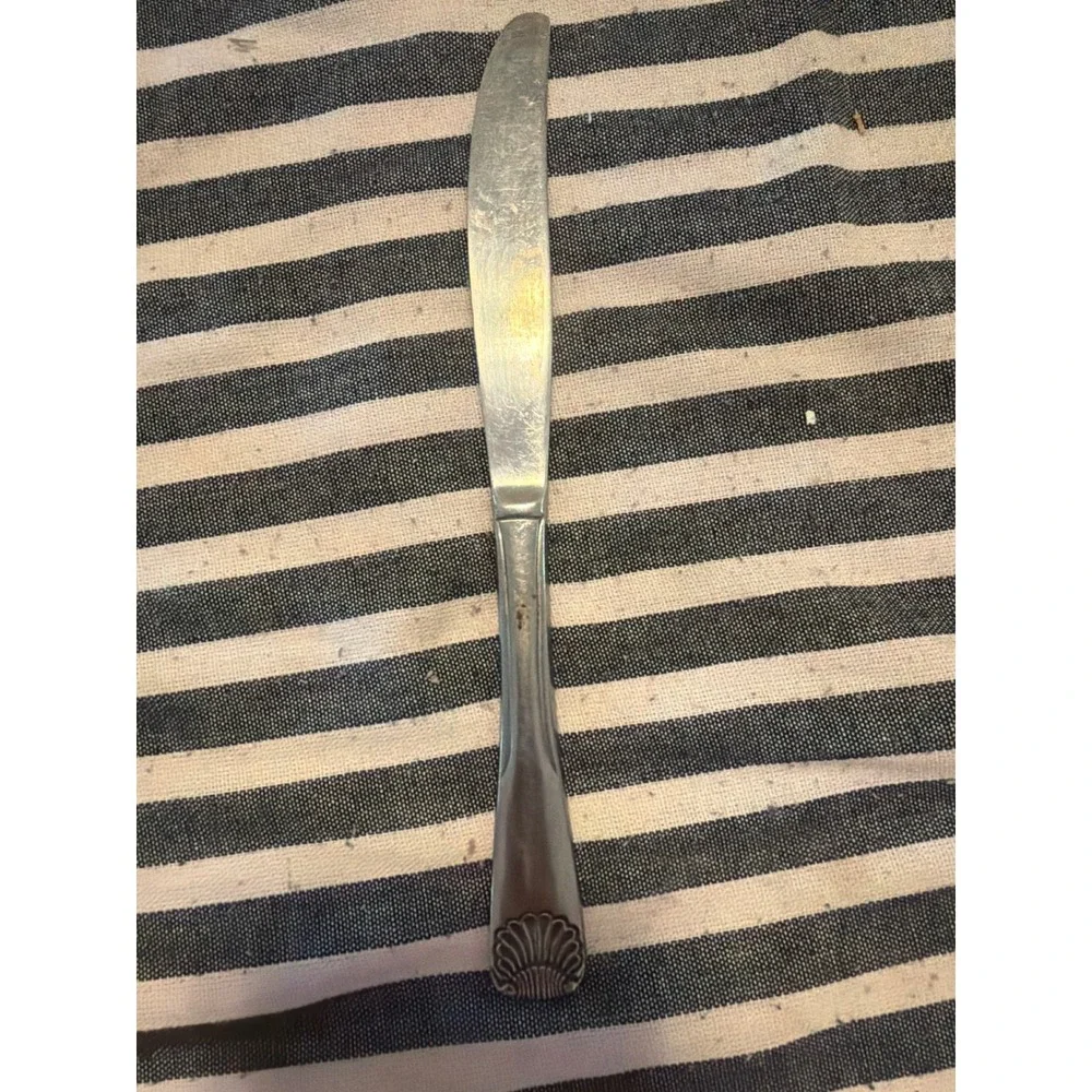 Frederick Marquand Stainless Steel Dinner Knife Shell Motif COIN